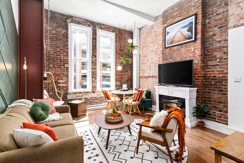 exposed brick in living room of downtown victoria condo